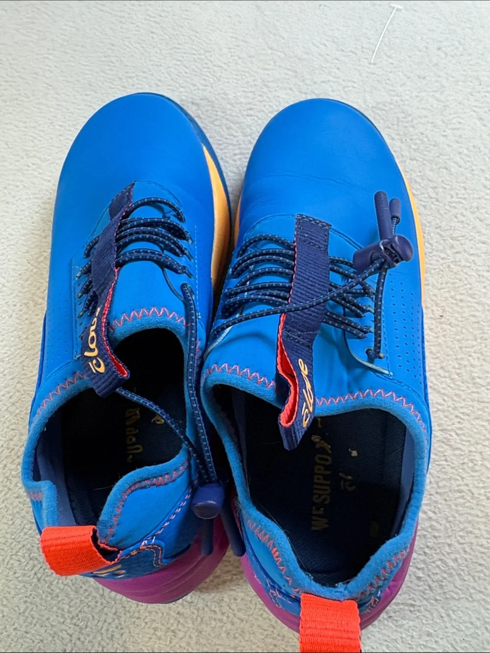 Clove Women's Blue Athletic Slip-On Trainers with Orange Accents